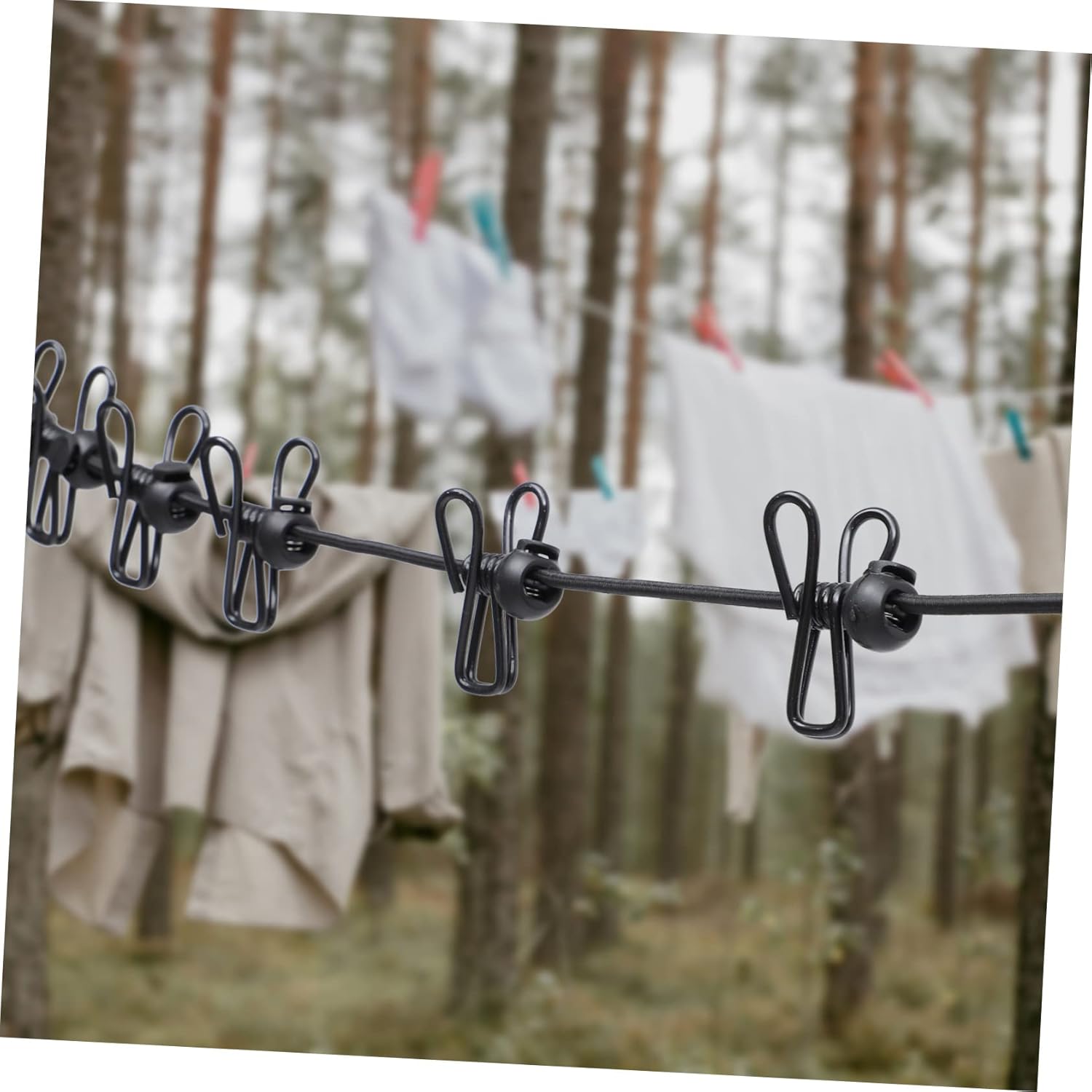 Franghie elastică retractabilă pentru uscarea rufelor, cu accesorii de agatat